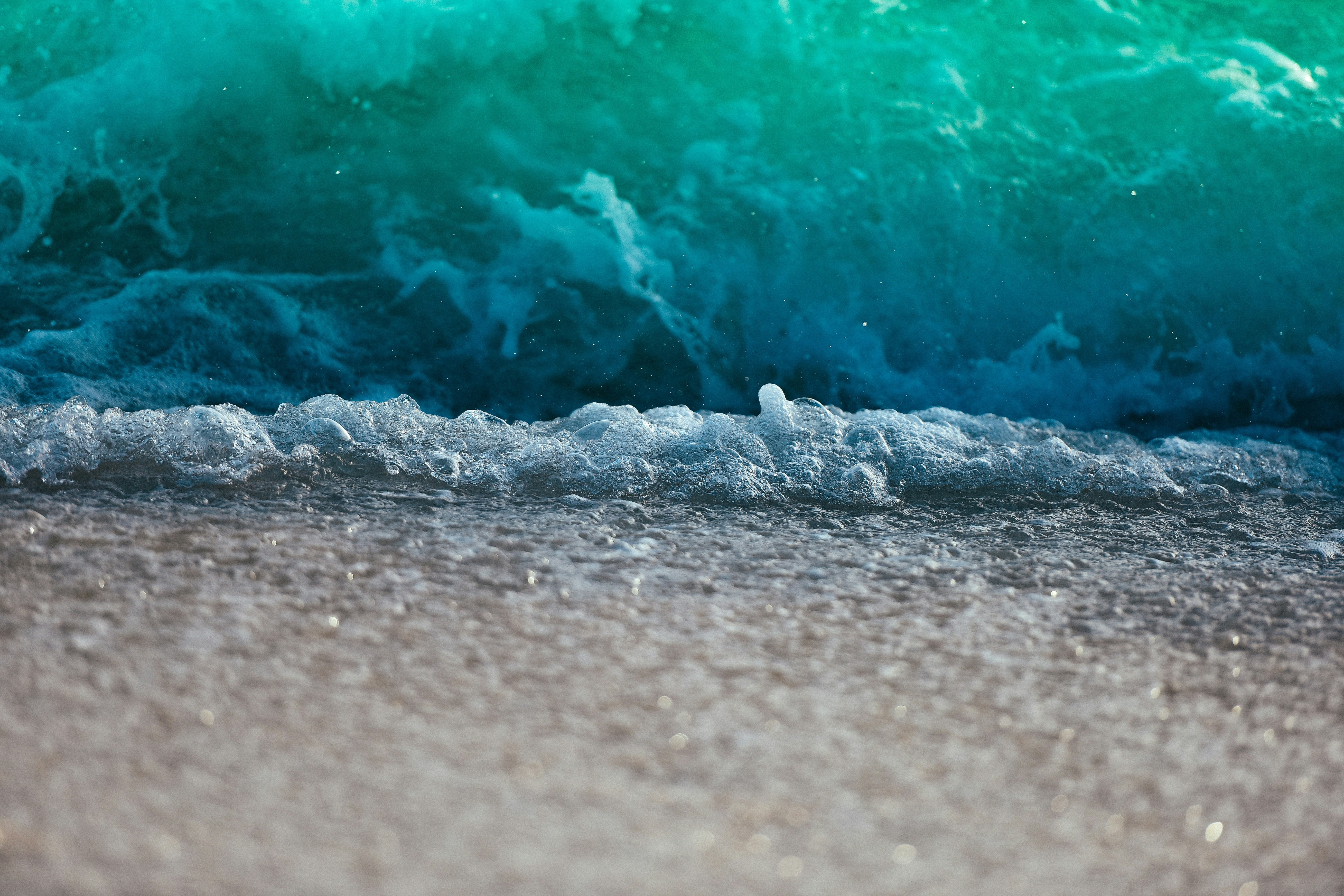 Bubbly wave at the bottom of a mountain.